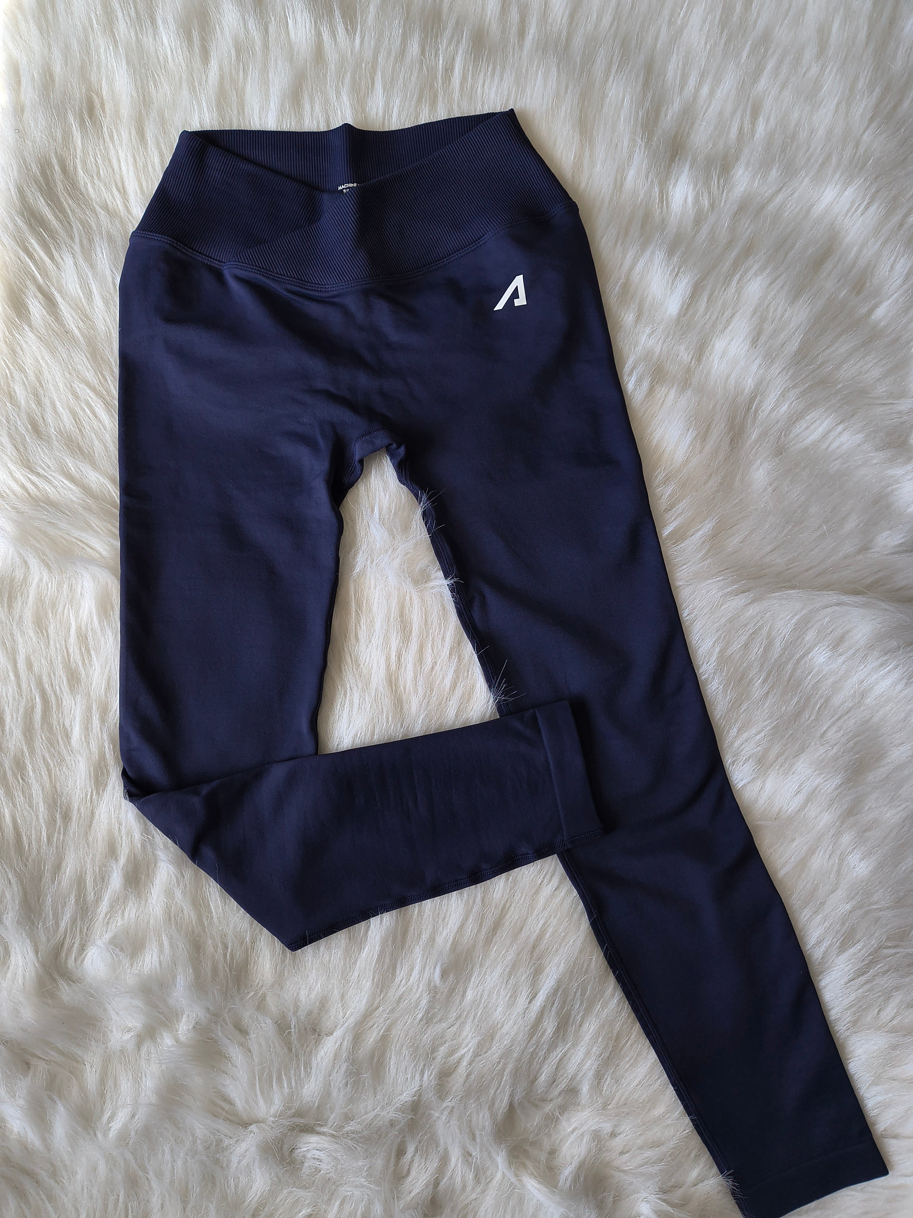 Navy high-rise cross leggings - back view with V-waistband detail