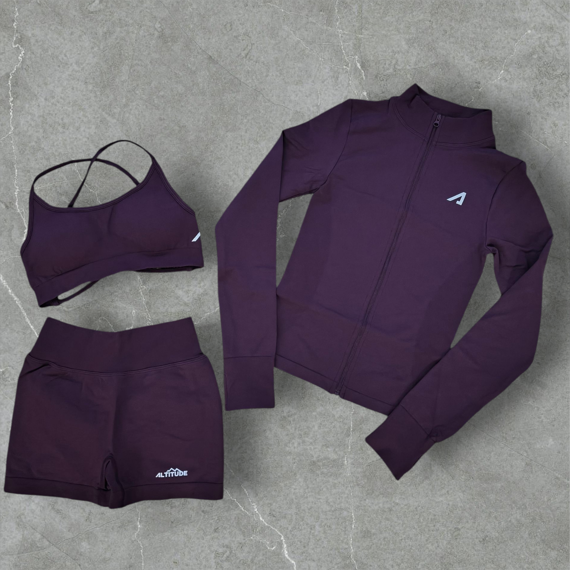 Plum seamless zip-up jacket - back view with mock neck detail